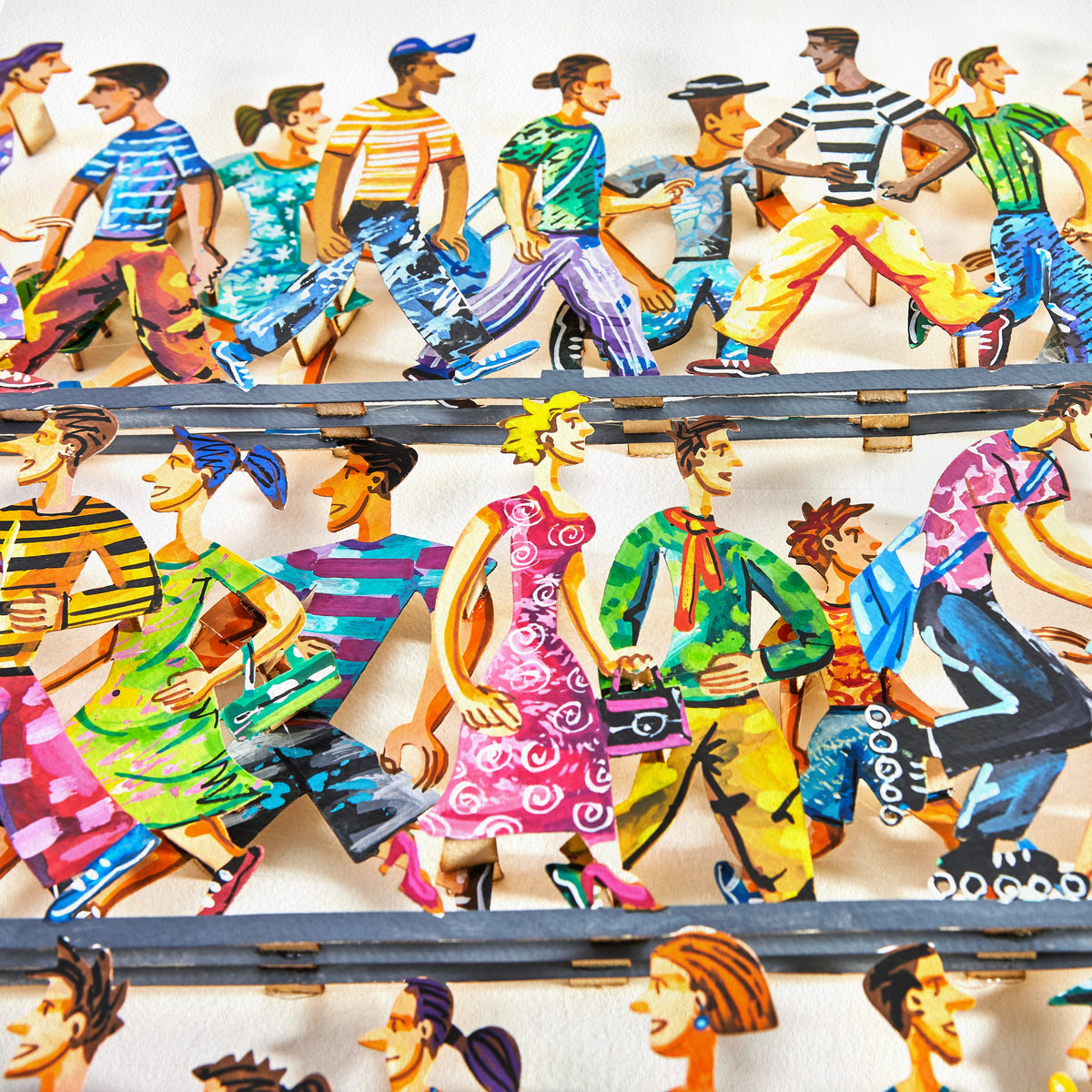 Close-up of David Gerstein's '5th Avenue' papercut sculpture, highlighting the intricate details and layers of vibrant color.