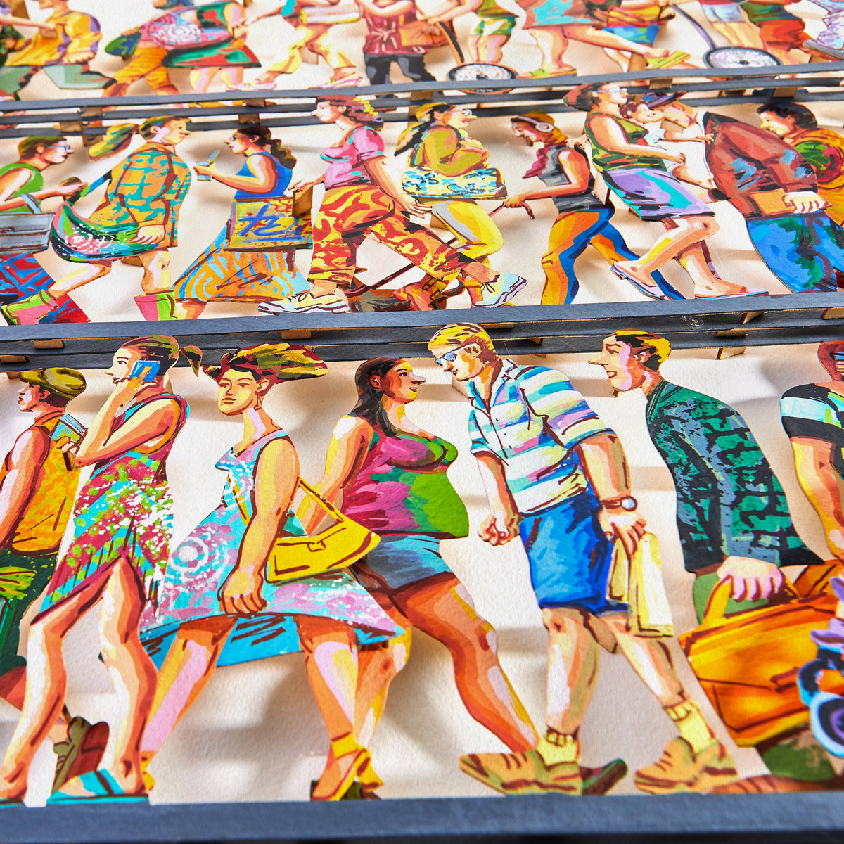 Close-up of David Gerstein's '5th Avenue' papercut sculpture, showing the intricate layers and vibrant colors in fine detail. The dynamic shapes create a sense of movement and depth, capturing the essence of the artwork.