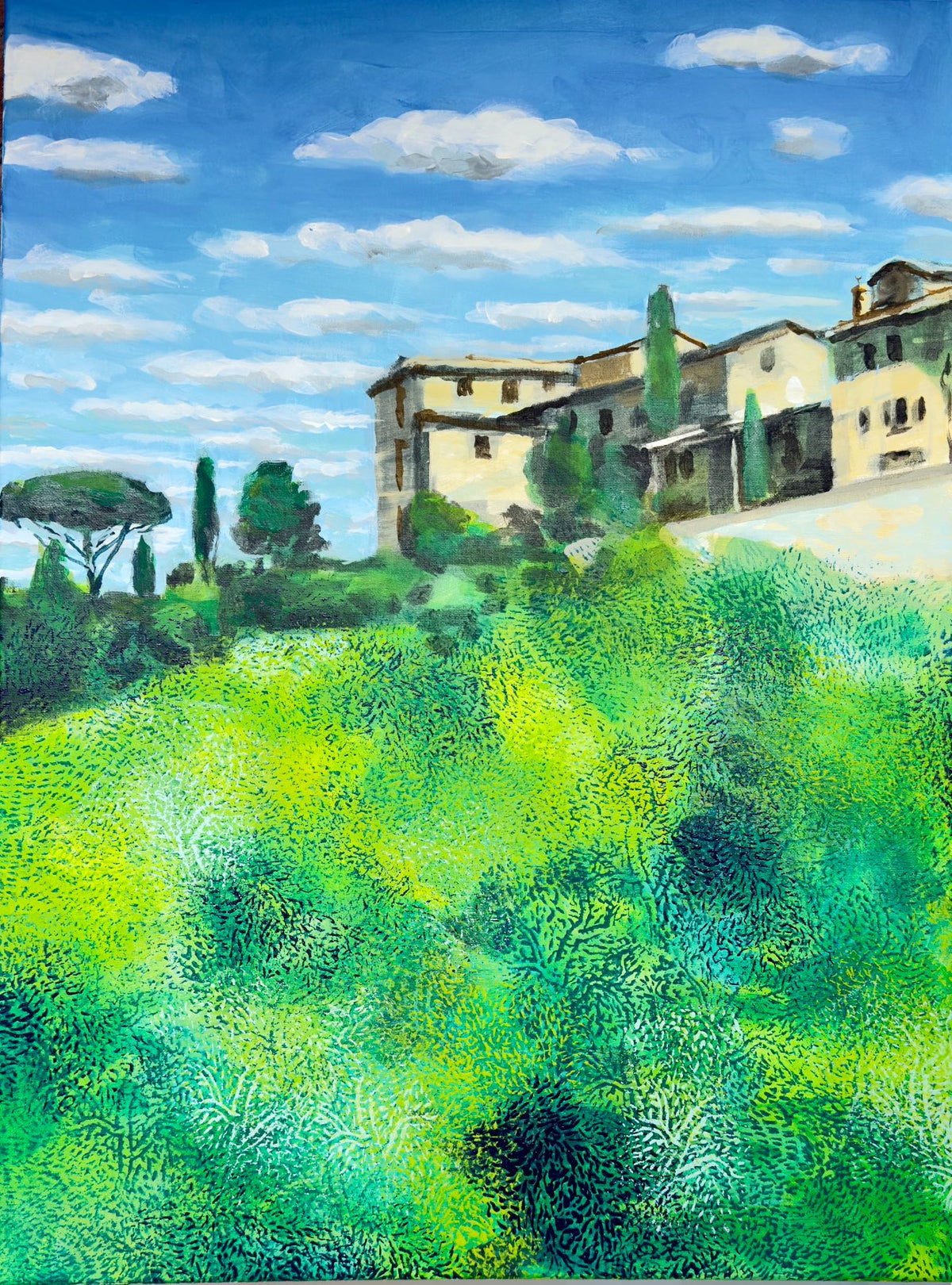 Painting of a village with green fields and blue sky