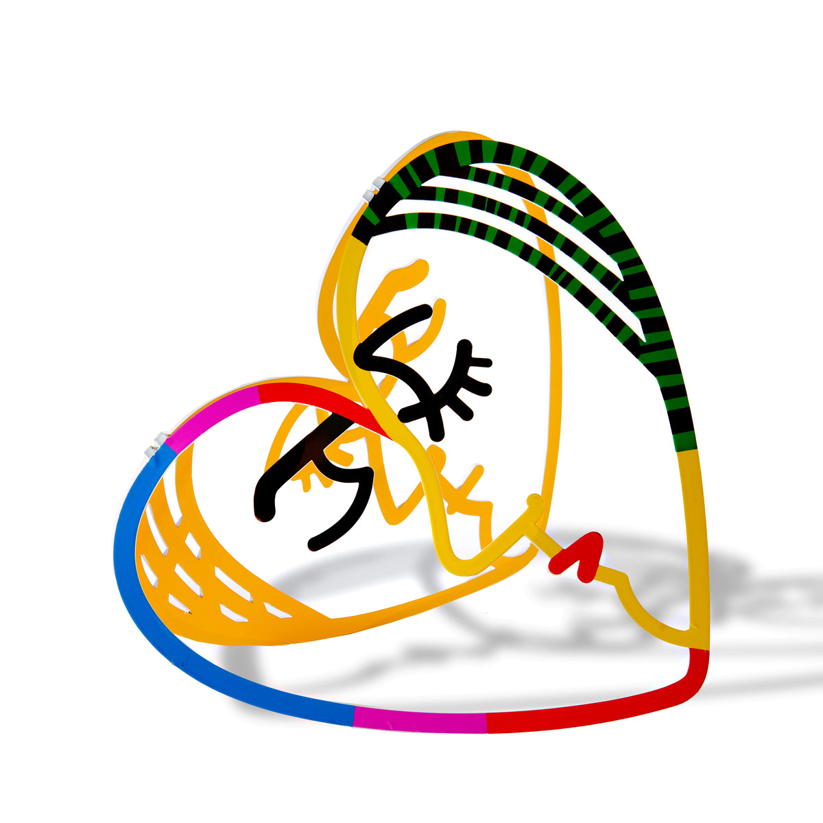 Small metal sculpture of a heart with two faces inside, set against a white backdrop. The piece highlights its intricate design and smooth finish, showcasing its artistic and contemporary style.